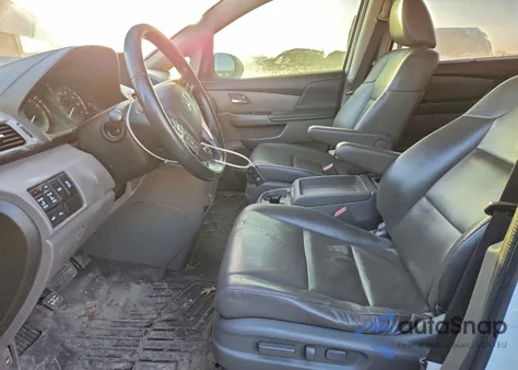 2014 Honda Odyssey Touring z USA, uszkodzony, nr VIN 5FNRL5H97EB077021